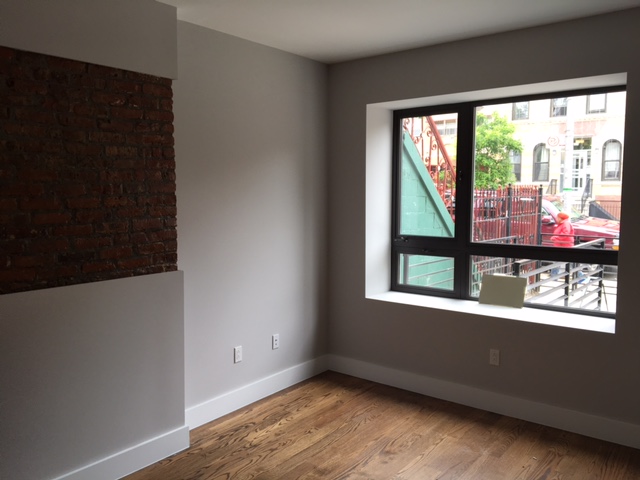 One bedroom of the 12 at the Bushwick house